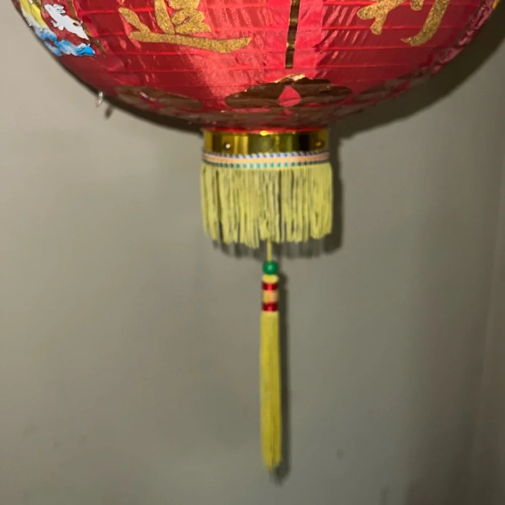 Red Decorative Lantern with Gold Accents